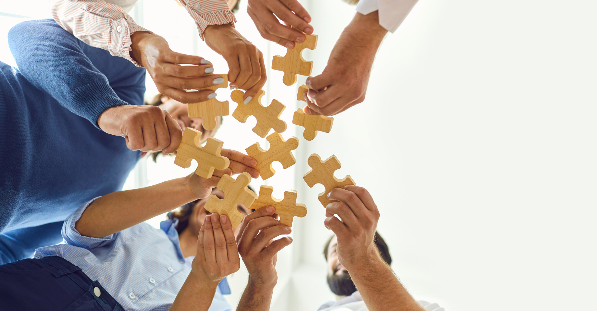 Employee's holing a puzzle together 